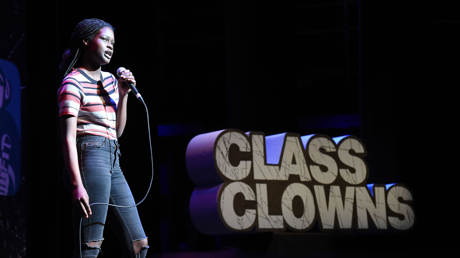 Young Comedian competing in Class Clowns on stage