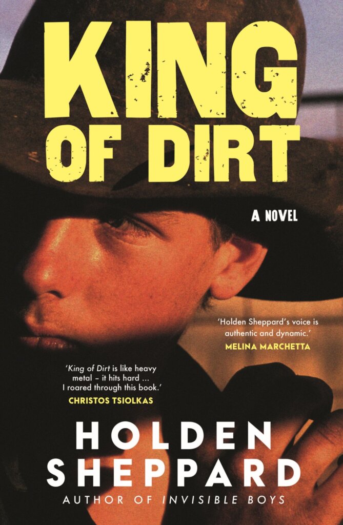 Book cover for King of Dirt by Holden Sheppard featuring a close-up of a young person in a wide-brimmed hat, bold yellow title text, and review quotes—perfect for fans attending In Conversation with Holden Sheppard - Brisbane Powerhouse 2025.