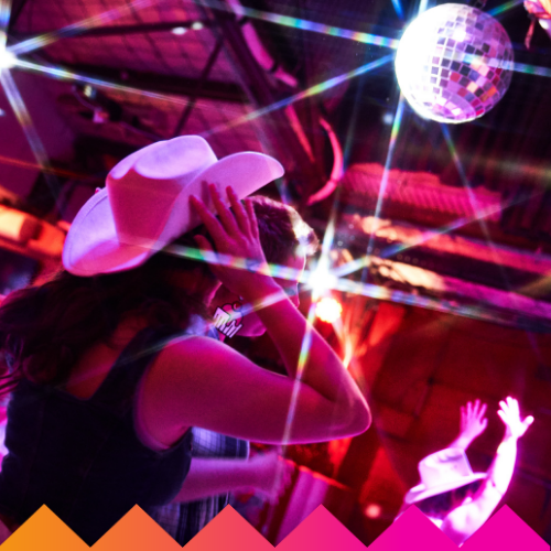 A person wearing a white cowboy hat dances under a sparkling disco ball, twirling an LED HULA HOOP, in a vibrant venue with pink and purple lighting at Ubuntu Social Brisbane Powerhouse. Other dancers are visible in the background.