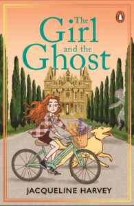 Book cover of The Girl and the Ghost by Jacqueline Harvey. A girl with long red hair rides a bicycle with a basket of bread, accompanied by a yellow dog, in front of a large mansion lined with tall trees. A faint ghost figure appears nearby.