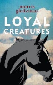 Book cover for Loyal Creatures by Morris Gleitzman, featuring a black and white illustration of a horse’s head with a hand gently touching it, set against a cloudy sky background.