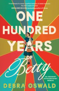 Book cover of One Hundred Years of Betty by Debra Oswald, featuring a woman in vintage clothing standing against a colorful, radiating background of red, blue, orange, and green stripes.