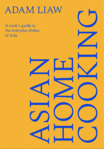 Book cover for Asian Home Cooking by Adam Liaw. Yellow background with blue vertical text and the subtitle A cook’s guide to the everyday dishes of Asia in small font on the upper left.