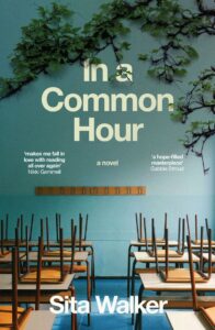 Book cover for In a Common Hour by Sita Walker, featuring an empty classroom with chairs stacked on desks and green vines growing on a teal wall. Reviews and the authors name appear on the cover.