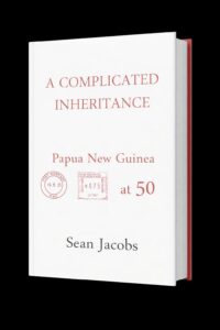 A book titled A Complicated Inheritance: Papua New Guinea at 50 by Sean Jacobs, with a white cover, red text, and red stamp graphics.