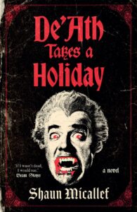 Vintage-style book cover showing a vampire with glowing red eyes and fangs. Title in bold red: DeAth Takes a Holiday. Author: Shaun Micallef. Quote: If I wasnt dead, I would sue, attributed to Bram Stoker.